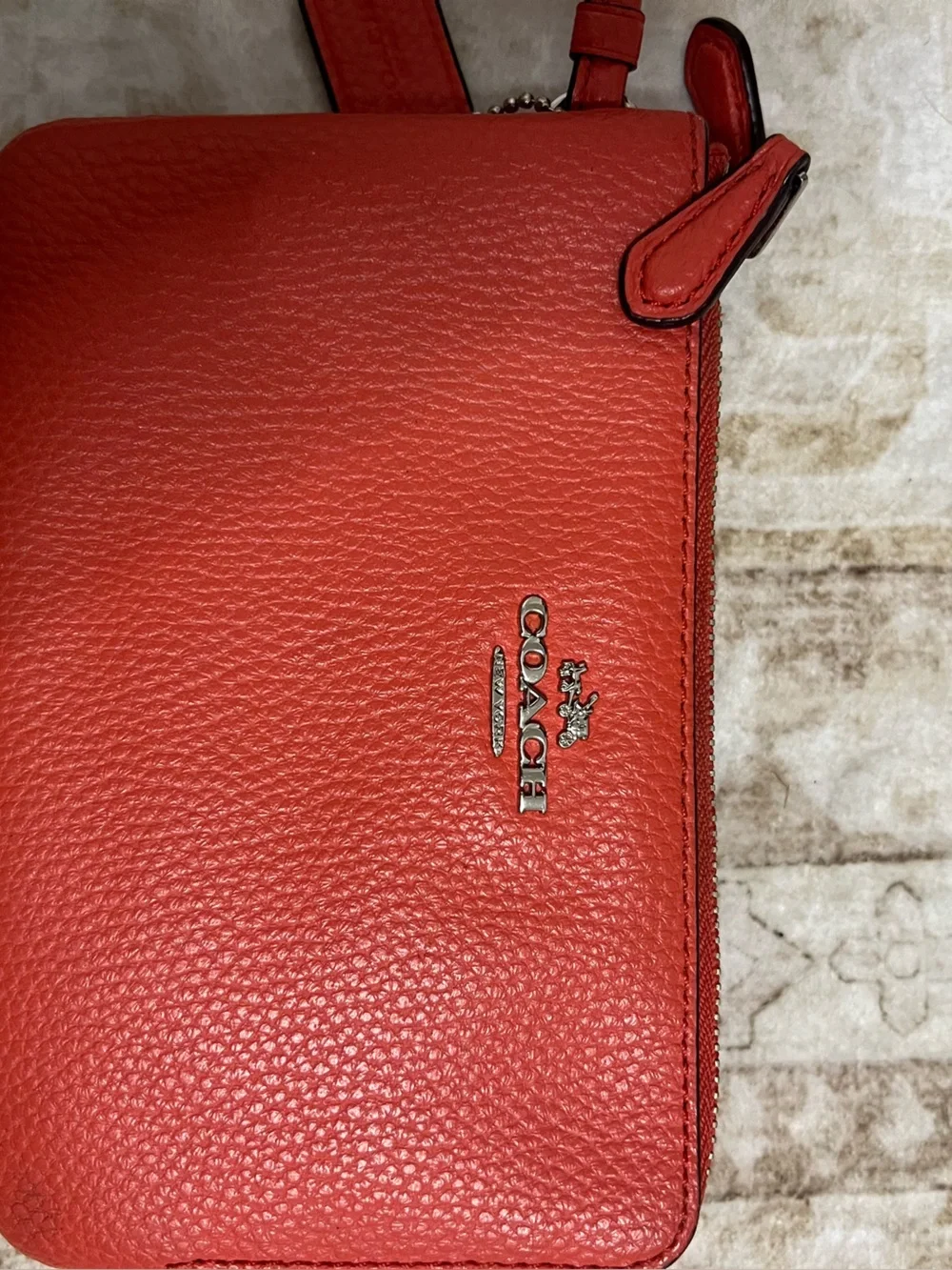 Coach Pebbled Leather Wristlet in Salmon